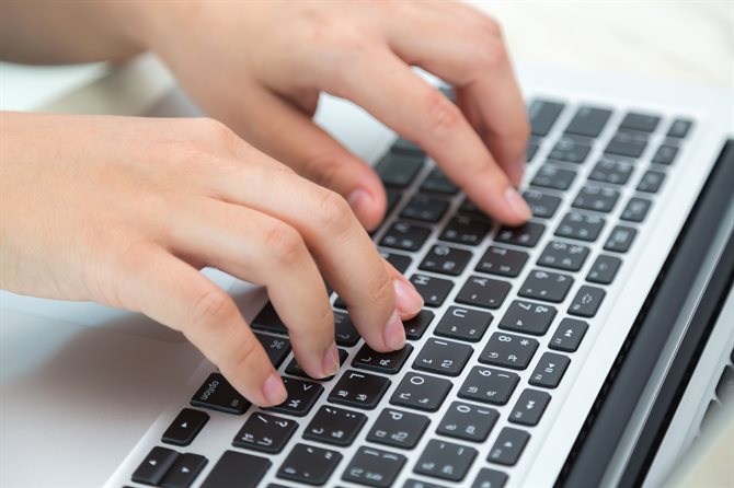 Hands on a keyboard